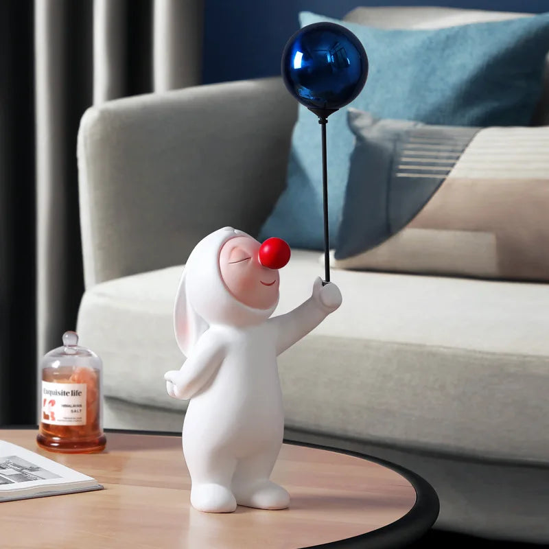 Small Lovable Figurine With Balloon Decor