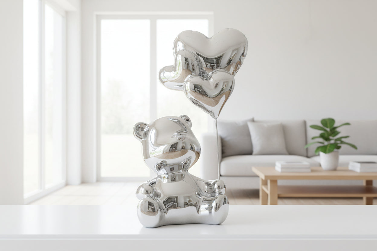 Close-up of silver love bear figurine