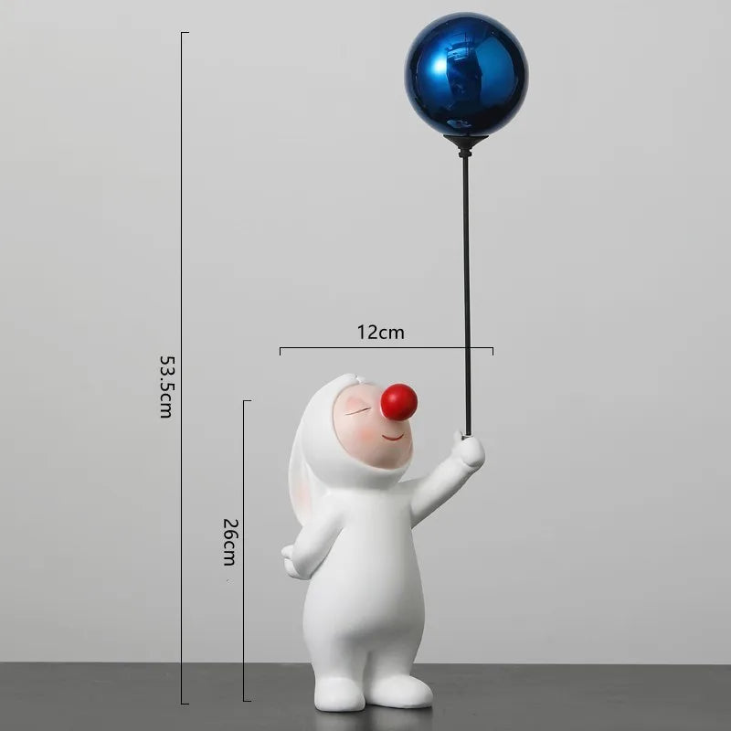 Small Lovable Figurine With Balloon Decor