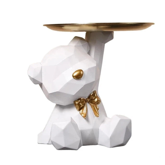 Close-up of white geometric bear statue detail