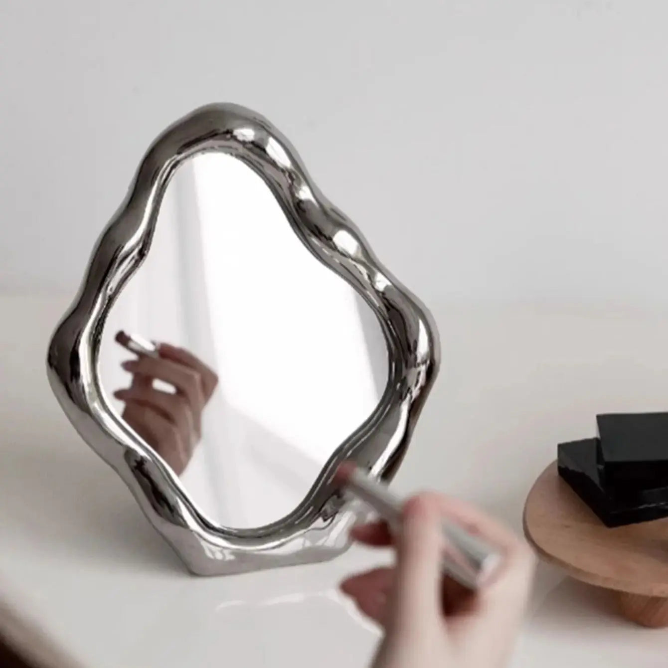 Contemporary framed mirror with a silver frame
