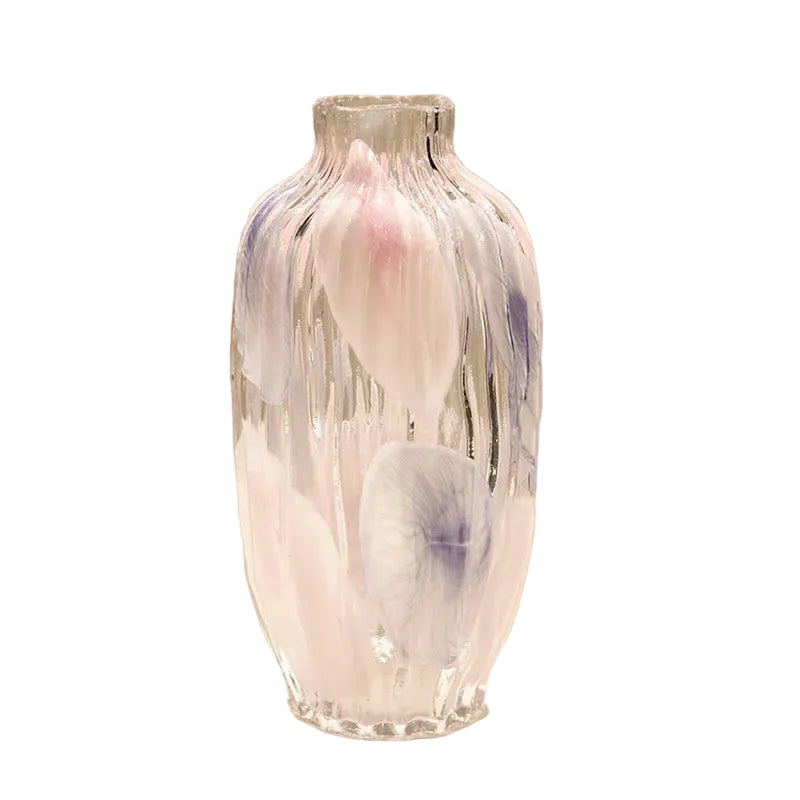 Decorative glass vase with abstract design on a beige background