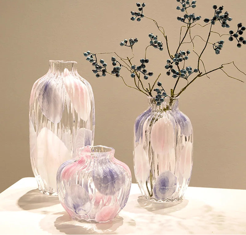 Set of three decorative vases with a neutral background