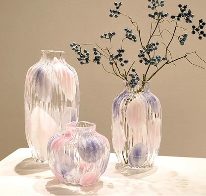 Set of three decorative vases with a neutral background